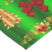 Kerstdecorpties op groen tafelkleed (Gekanteld)