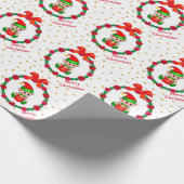 Kerstelf, dennenkruid, poinsettias en sterren cadeaupapier (Hoek)