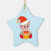 Kerstelf op lichtblauw keramisch ornament (Links)