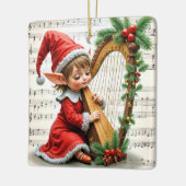 Kerstelf speelt op een harp keramisch ornament (Links)