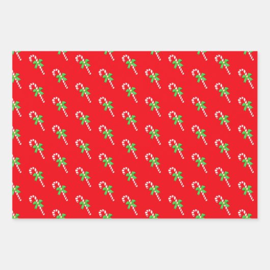 Kerstelf, sterrenpatroon en snoepsnoeren op rood inpakpapier vel (Voorkant 3)
