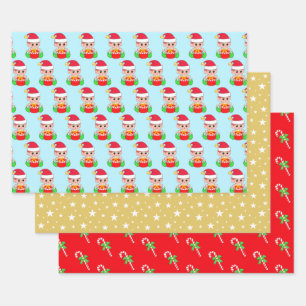 Kerstelf, sterrenpatroon & snoepstokken op rood inpakpapier vel