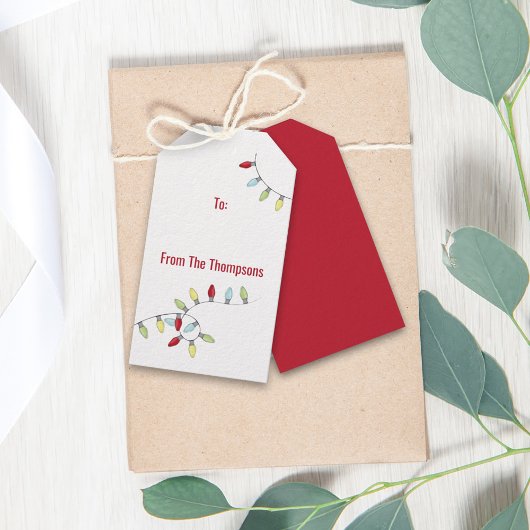 kerstfeestdag kleurrijke feestelijke strijklichten cadeaulabel