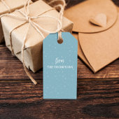 kerstfeestdag met juffiele tipografie met zandband cadeaulabel