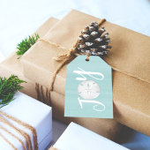 kerstfeestdag met juffiele tipografie met zandband cadeaulabel