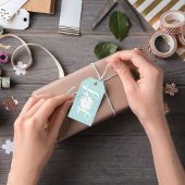 kerstfeestdag met juffiele tipografie met zandband cadeaulabel