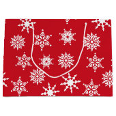 Kerstfeestelijke rode en witte sneeuwvlokken groot cadeauzakje (Voorkant)