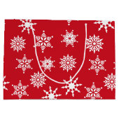 Kerstfeestelijke rode en witte sneeuwvlokken groot cadeauzakje (Achterkant)