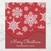 Kerstfeestelijke witte wintersneeuwvlokken op een  wijn etiket (Enkel label)