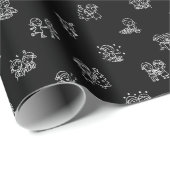 Kerstfiguurtjes in wit op zwart cadeaupapier (Rol Hoek)