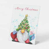 kerstgebaar met cadeau reclamebord met voetstuk (Voorkant)