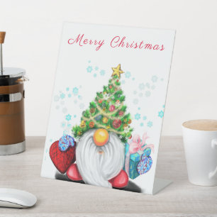 kerstgebaar met cadeau reclamebord met voetstuk