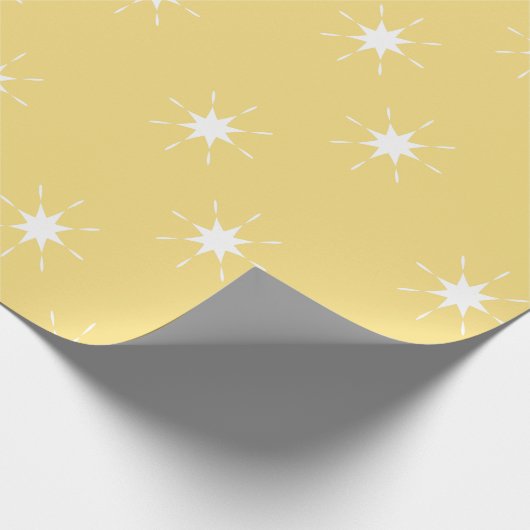 Kerstgeel en wit met sterren cadeaupapier (Hoek)