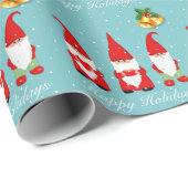 Kerstgnomen en cellen op lichtblauw cadeaupapier (Rol Hoek)