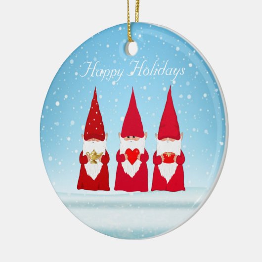 Kerstgnomen op lichtblauw keramisch ornament (Links)