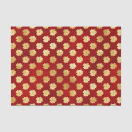 Kerstgoud in Poinsettias op rood Tissuepapier