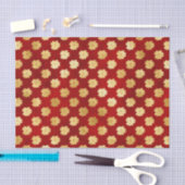 Kerstgoud in Poinsettias op rood Tissuepapier (Craft)