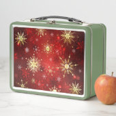 Kerstgouden sneeuwvlokken op rode achtergrond (In situ)