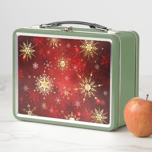 Kerstgouden sneeuwvlokken op rode achtergrond (In situ)