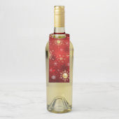 Kerstgouden sneeuwvlokken op rode achtergrond flessenhanger (Op fles)