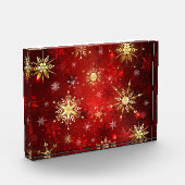 Kerstgouden sneeuwvlokken op rode achtergrond fotoblokken (Links)