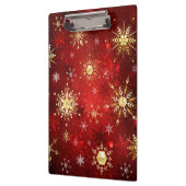 Kerstgouden sneeuwvlokken op rode achtergrond klembord (Links)