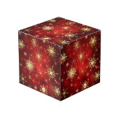 Kerstgouden sneeuwvlokken op rode achtergrond kubus (Voorkant hoekig)