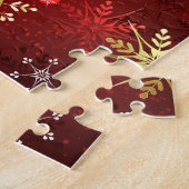 Kerstgouden sneeuwvlokken op rode achtergrond legpuzzel (Zijkant)