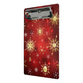 Kerstgouden sneeuwvlokken op rode achtergrond mini klembord (Angled2)
