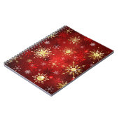 Kerstgouden sneeuwvlokken op rode achtergrond notitieboek (Linkerzijde)