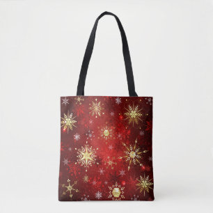 Kerstgouden sneeuwvlokken op rode achtergrond tote bag