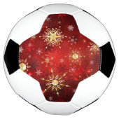 Kerstgouden sneeuwvlokken op rode achtergrond voetbal (Gedraaid)