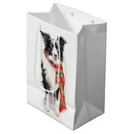 Kerstgrenscollie in sneeuwvlokken medium cadeauzakje