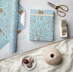 Kerstherten op blauw cadeaupapier