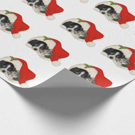 Kersthond en kat in een kersthat cadeaupapier (Hoek)