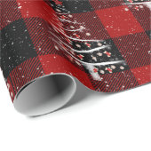 Kersthonkbal en rode sokboom op tast cadeaupapier (Rol Hoek)