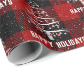 Kersthonkbal en rode sokboom op tast cadeaupapier (Rol Hoek)