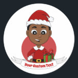 Kerstjongen cartoon klassieke ronde sticker<br><div class="desc">Kerst stickers met een afbeelding van een schattig lachend Afrikaans-Amerikaans jongetje met een kort zwart haar draagt de jongen een kerstkleed met een rood pet en houdt een cadeau vast; in een rode cirkel op een witte achtergrond, een ontwerp met kerstfeestdagen met een bewerkbare tekstsjabloon voor jouw naam of een...</div>