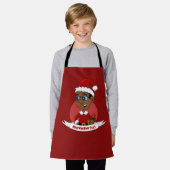 Kerstjongen met een rood pet en een glazen pron schort (Gedragen)