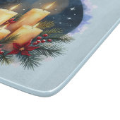 Kerstkaars gloed met poinsettia's snijplank (Hoek)