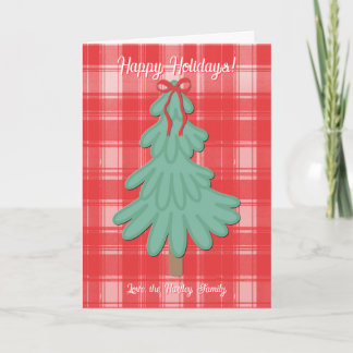 Kerstkaart met fantasievolle kerstboom en geruite feestdagen kaart
