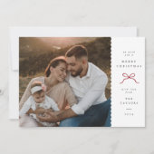 Kerstkaart met golvende rand en rode strik foto (Voorkant)