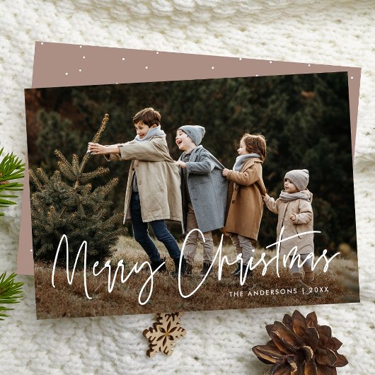 Kerstkaart met handgeschreven Kerstmis foto