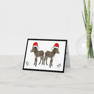 Kerstkaart met hulst en ezel feestdagen kaart