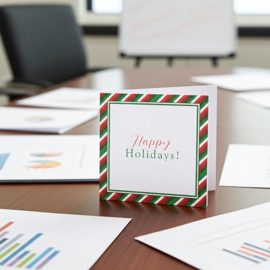 Kerstkaart met rode, groene en witte strepen en lo kaart