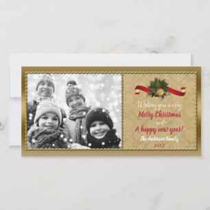 Kerstkaart met vintage gouden bel foto