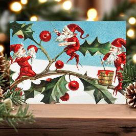 Kerstkaart met vintage kerstelfjes en hulst feestdagenkaart