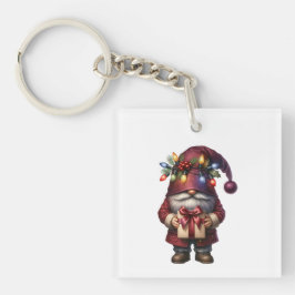 Kerstkabouter met fantasievol cadeau sleutelhanger