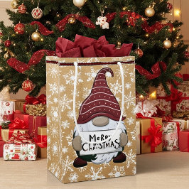 Kerstkabouter op papieren zak uitzicht klein cadeauzakje