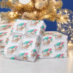 Kerstkabouters in slee cadeaupapier